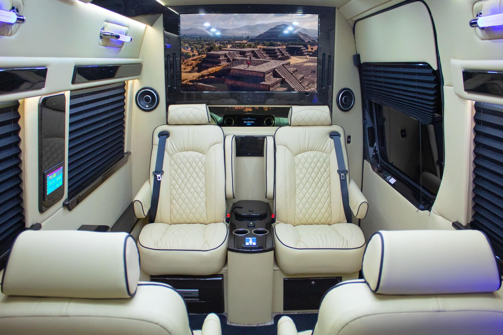 Ultimate Limo interior captain's chairs and LED tv