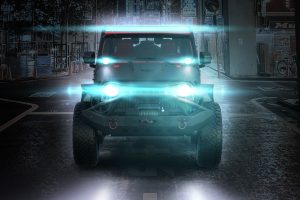 Ultimate Jeep on dark street with lights on