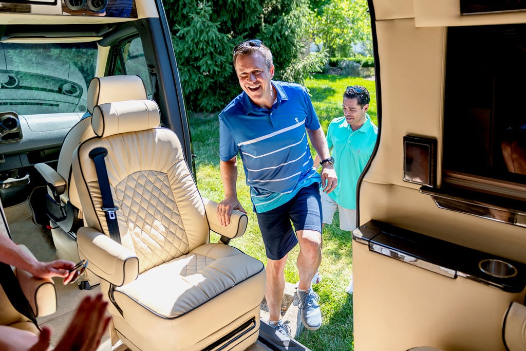 golfer entering the custom mercedes van