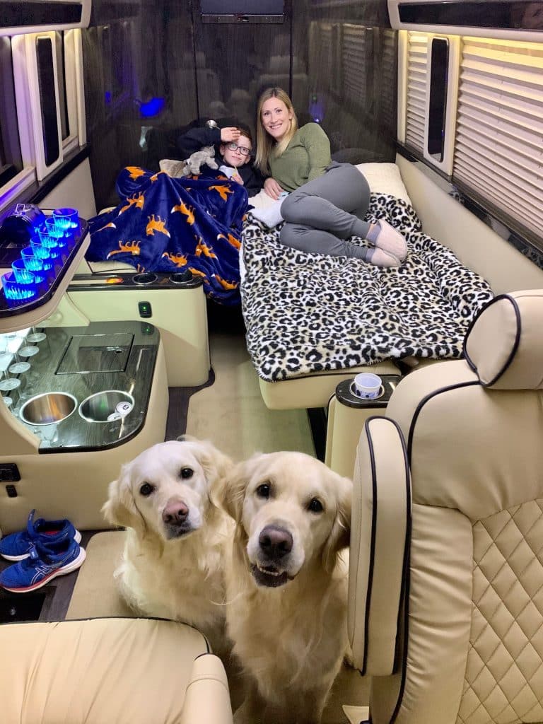 family getting ready for bed in ultimate traveler mercedes rv.