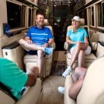 people enjoying the cabin in the Ultimate Coach